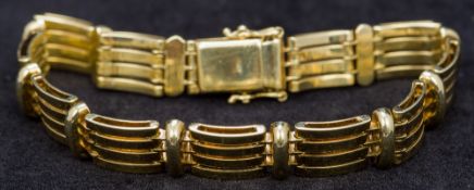 A mid-20th century 14 ct gold bracelet Of articulated form. 18.5 cm long.