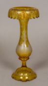 A 19th century Bohemian etched amber glass vase Of slender flared form,