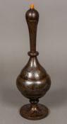 A 19th century damascened Qajar steel bottle vase and cover Typically worked with foliate vignettes;