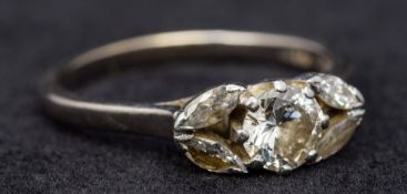 An 18 ct white gold and platinum diamond ring The central stone spreading to approximately 0.