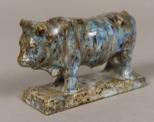 REGINALD FAIRFAX WELLS (1877-1951) British, Stoneware Soon Bull Impressed London. 13 cm long.