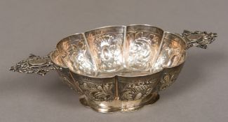 A Continental twin handled lobed footed bowl,