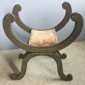 A 19th century Kashmiri stool Typically decorated and of X-frame form with a padded seat. 61.