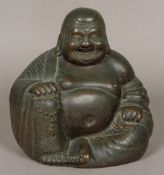 A 19th century patinated bronze figure of Buddha Typically modelled seated, holding beads.