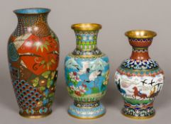 A Chinese cloisonne vase Decorated in the round with figures in a horse drawn carriage and mythical