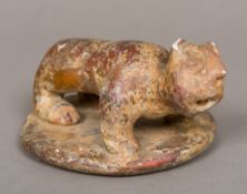 A Pre-Columbian pottery model of a jaguar 14 cm long.