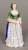 A 19th century Russian Popov porcelain figure Modelled as a fashionable lady,