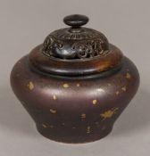 A Chinese gilt splashed bronze censer Of baluster form with carved and pierced wood cover and