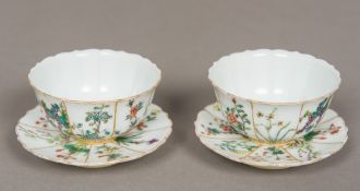 A pair of superb quality Chinese porcelain "Imperial" wine cups and saucers Each decorated with