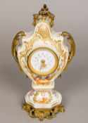 A gilt metal mounted porcelain mantle clock The 2 1/8 inch white enamelled dial with Arabic