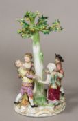 A 19th century Meissen porcelain figural group Formed as four children dancing around a fruiting