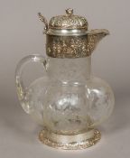 A 19th century Continental silver mounted etched glass claret jug, probably Hanau,