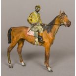 An early 20th century cold painted bronze figure of a horse and jockey, probably Austrian 11.