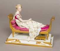 A GDR porcelain figure of Madame Recamier, possibly Sitzendorf Typically modelled. 24.5 cm wide.