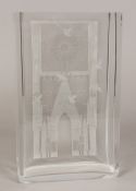 An Orrefors glass vase Of rectangular section, etched with birds before a Gothic cathedral porch,