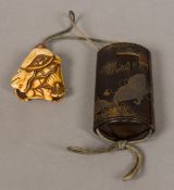 A Japanese Meiji period lacquered inro The outer sheath decorated with butterflies and a bow tied