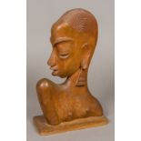 A carved wooden bust of a stylised African women, in the Hagenauer style 31.5 cm high.