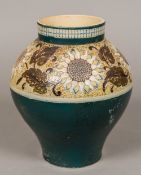 A Victorian Martin Brothers pottery vase Of baluster form, decorated with sunflowers,