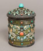 A Chinese silver and enamel clad green hardstone pot and cover Worked with phoenixes and pearls