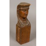 A French Empire carved wooden bust Of female form, wearing a headdress, above a panelled block.