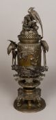 A Japanese bronze censer and cover The body extensively cast with birds in a continuous river