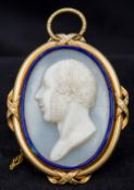 A finely worked portrait cameo of a bearded gentleman Mounted in an unmarked gold frame with brooch