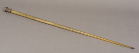 A 19th century Chinese unmarked white metal handled horn walking stick The handle repousse