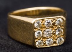 An 18 ct gold diamond set gentleman's ring With three rows of three stones.