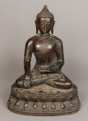 A Chinese bronze figure of Buddha Typically worked, on a lotus cast plinth base. 52.5 cm high.