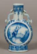 A 19th century Chinese blue and white porcelain miniature moon flask The elongated neck with twin