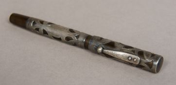 A vintage Waterman Ideal Sterling silver onlaid fountain pen 13.5 cm long.