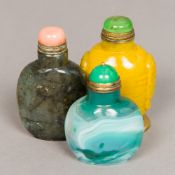 Three Chinese carved hardstone snuff bottles and stoppers One with gilt metal mount stamped HH Hart.