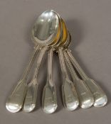 A matched set of six Victorian silver table spoons, hallmarked London 1842 and 1852,