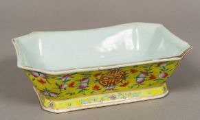 A 19th century Chinese famille jeune porcelain jardiniere Of dished canted rectangular form,