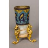 A Continental gilt metal and cloisonne mounted alabaster pot Standing on gilt metal winged lion