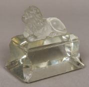 A moulded and cut glass desk weight