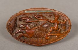 A 19th century carved coquilla nut snuff