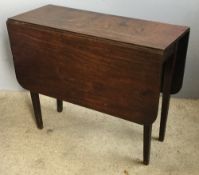 A small George III mahogany drop leaf gate leg table