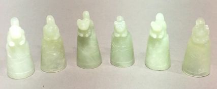 A set of six jade thimbles