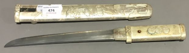 A silver plated tanto