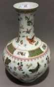 A Chinese porcelain vase decorated with butterflies