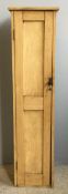 A narrow Victorian pine cupboard