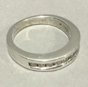 A 9 ct white gold diamond half eternity ring