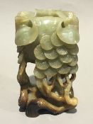 A Chinese carved jade brush washer