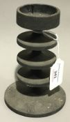 A Robin Welch modernist cast metal candlestick, as selected for the Design Centre,