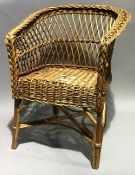 A cane child's armchair