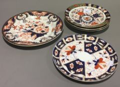 Five 19th century Crown Derby dishes decorated in the Imari Palette