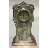 An embossed silver cased mantel clock