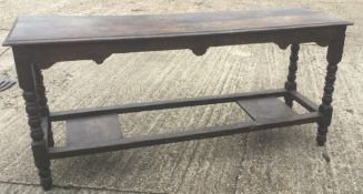 An 18th century oak alter type table