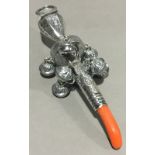 A silver rattle